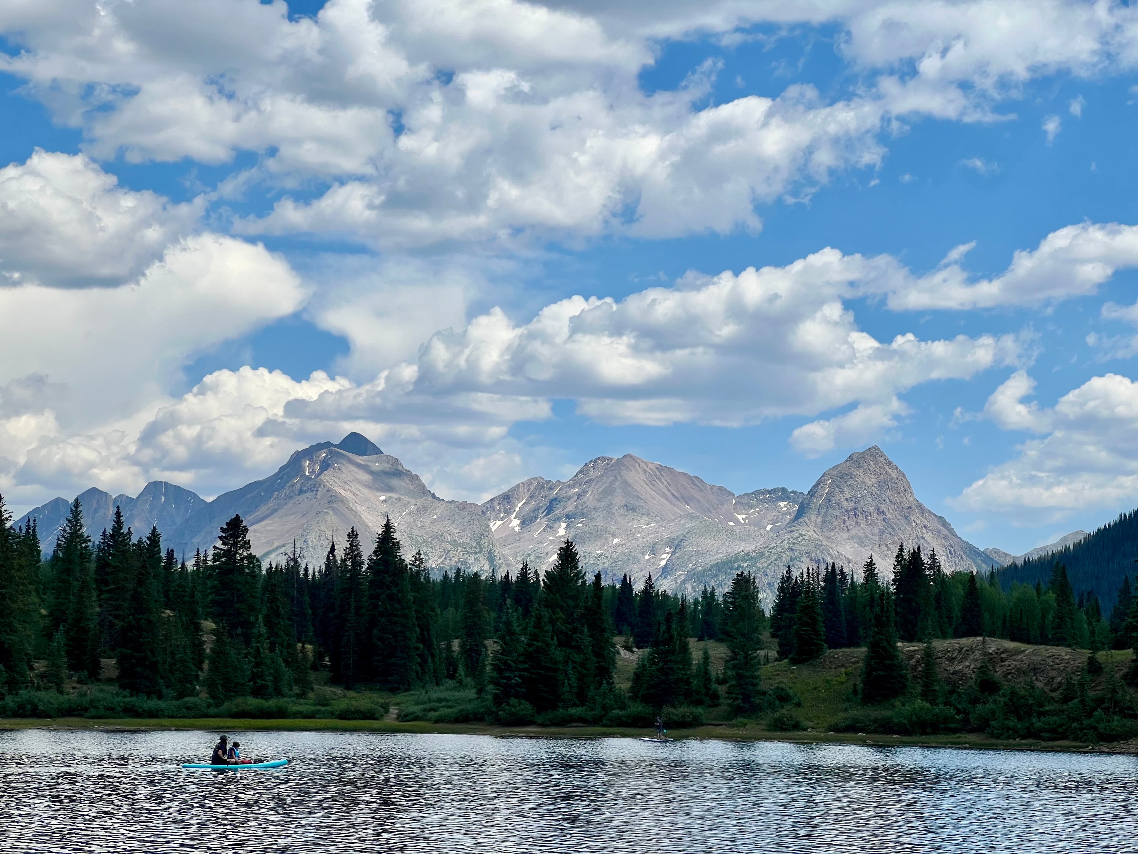 Kayaking on Molas Lake with mountain views