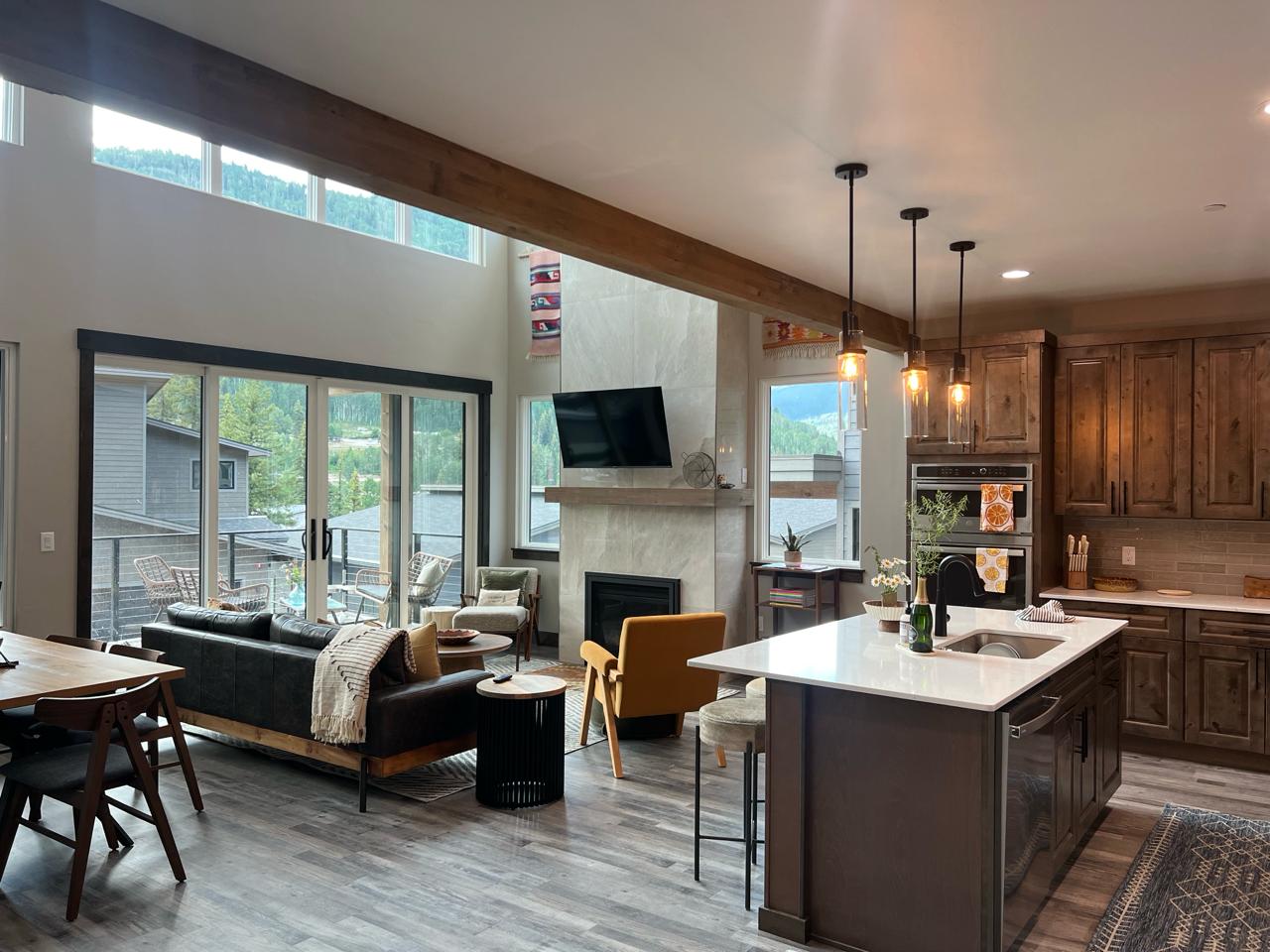 Open living room with vaulted ceilings and fireplace